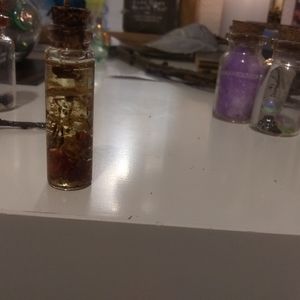 Decorative pendant with conjure oil ( necklace)